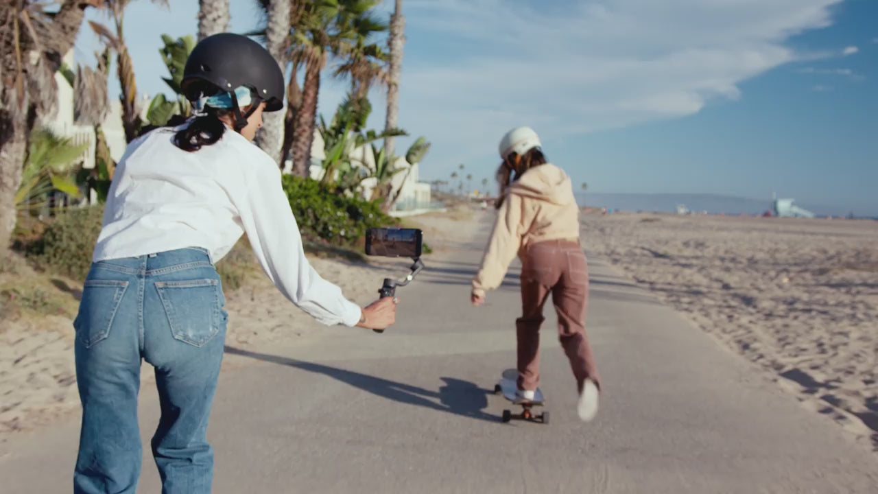 Portable DJI Osmo Mobile 6 gimbal with 3-axis stabilization, perfect for silky-smooth videos and selfies.